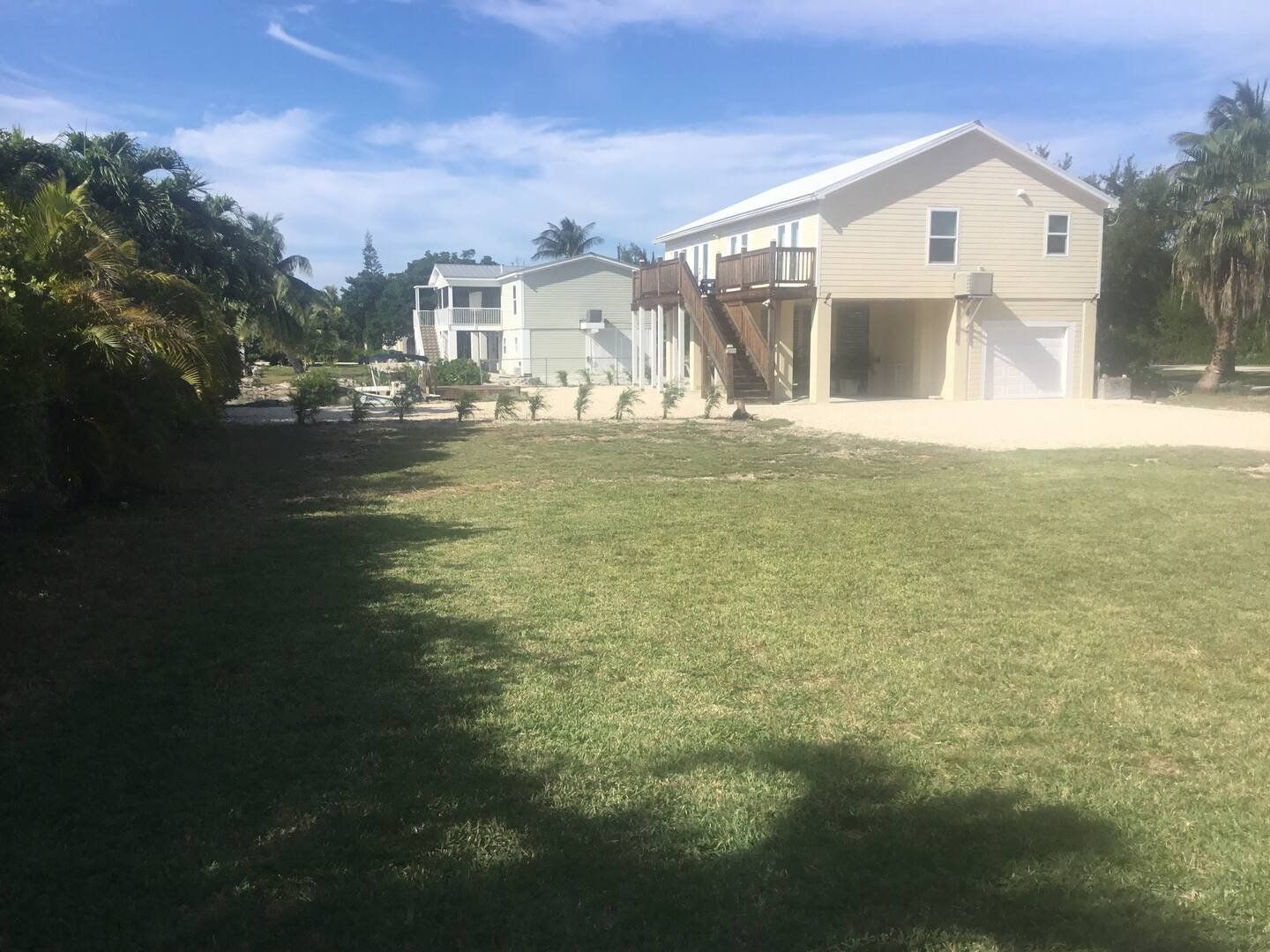 The lawn running down beside the house