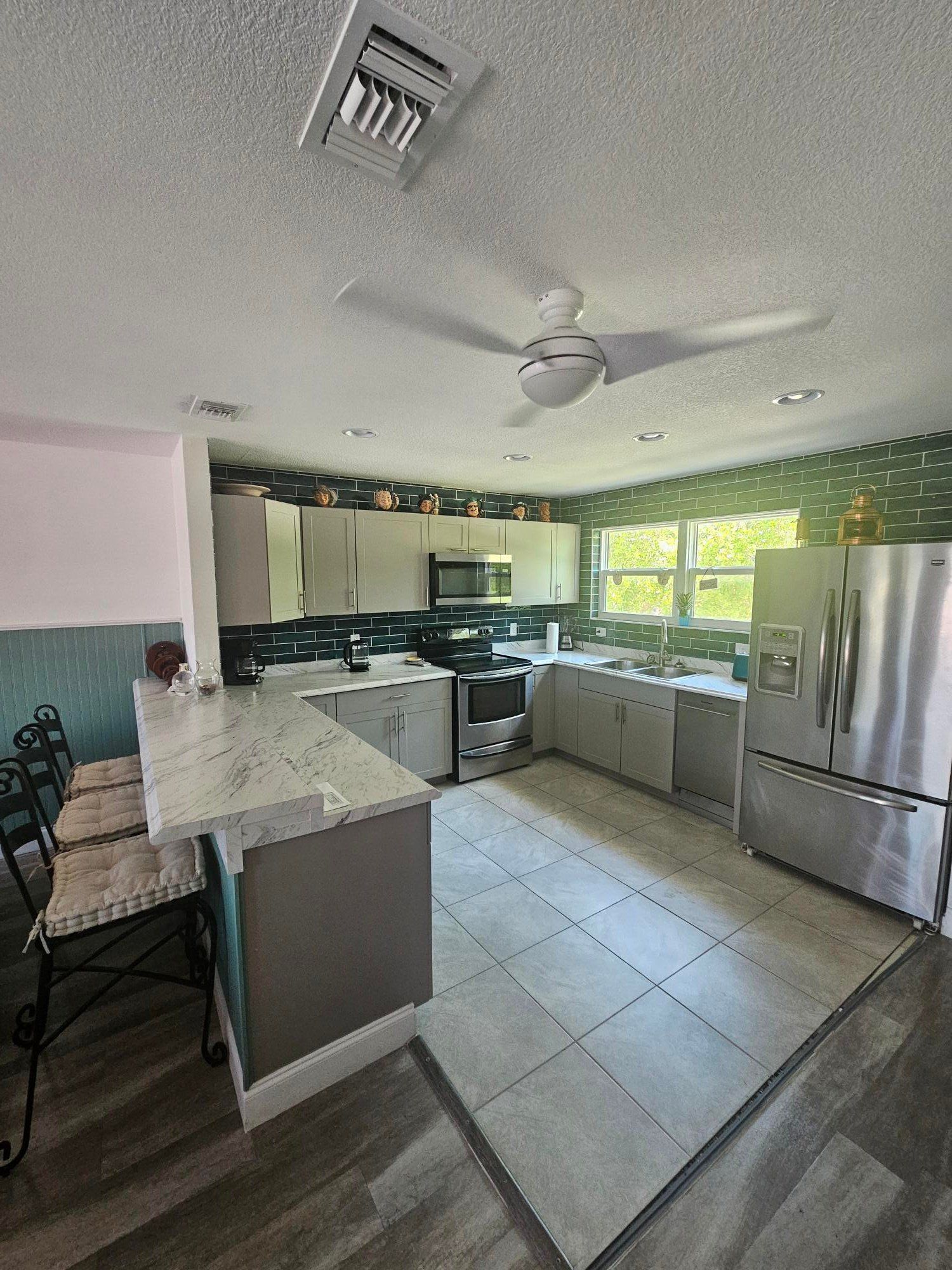 Kitchen island with breakfast stools